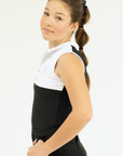 Person wearing a black and white outfit on a white background